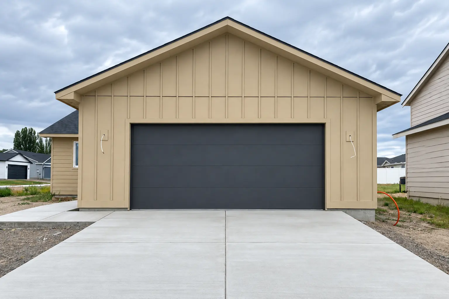 Single charcoal garage door installed on a Yakima Valley detached garage